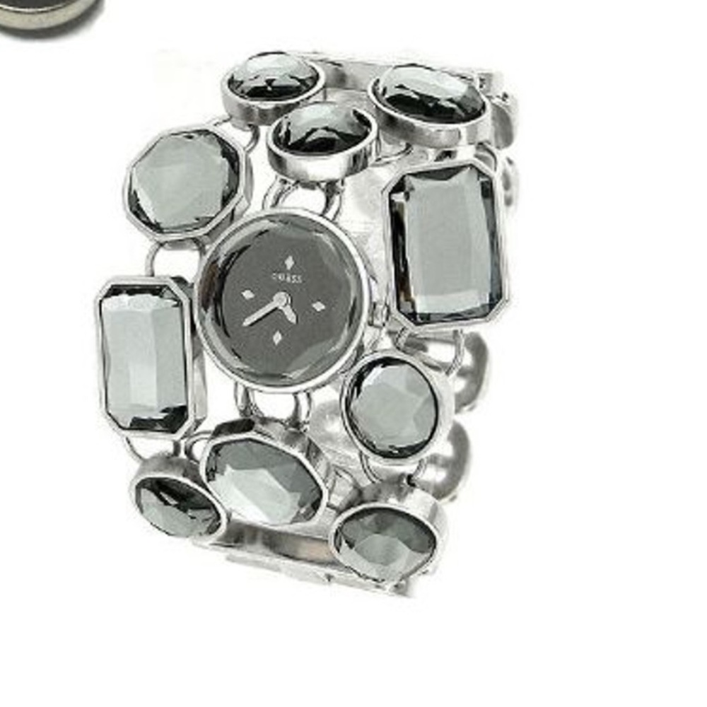 Gorgeous Guess watch bracelet with some fading on bracelet needs battery no box